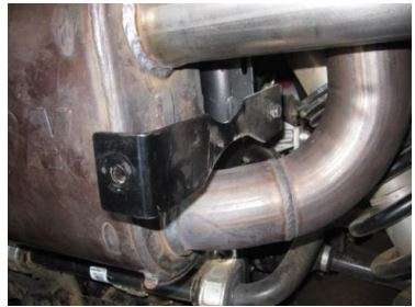 GIBSON 98023 Dual Rear Exhaust Instruction Manual - Install the provided heat shield bracket’s into the factory